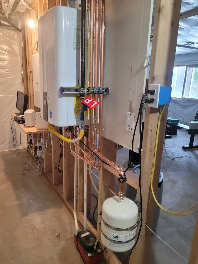 Licensed plumber repairing a kitchen sink in Coppell